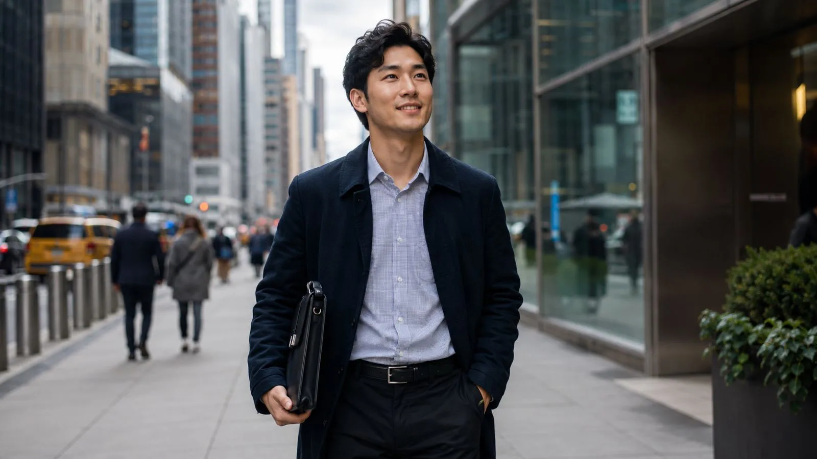 A confident professional walking through a busy urban business district — the calm aspirational outcome of a focused job search.